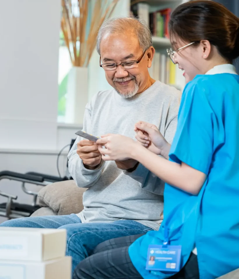 asian-nurse-with-physician-explaining-prescription-2023-11-27-05-03-36-utc